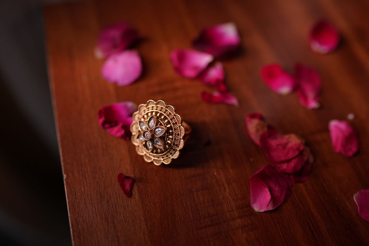 Gold-toned floral ring with intricate handcrafted detailing