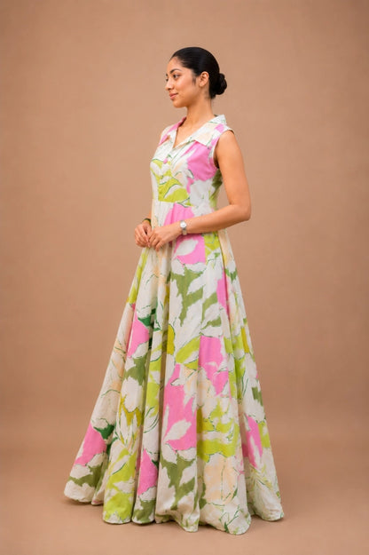 Side profile view of the Aira Botanical Mist Gown showing its elegant flared silhouette and smooth drape
