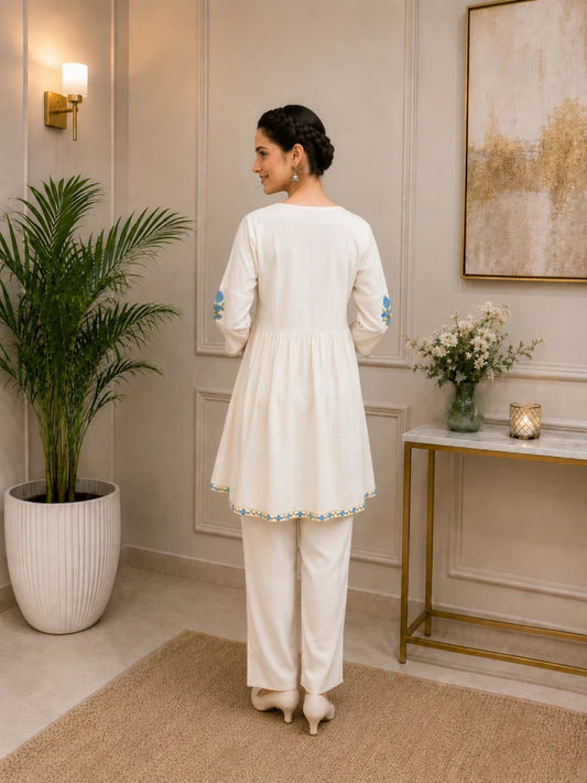 Back view of the Aira Butterfly Tunic showing elegant relaxed-fit tailoring