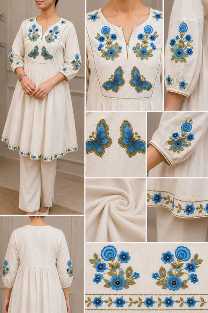 Close-up zoom of the premium fabric texture and clean stitching on the Aira Butterfly Tunic
