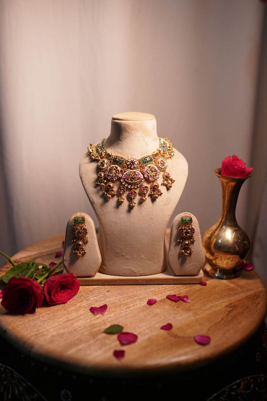 Fashiyano Bridal Temple Antique Necklace featuring traditional Nakshi work and intricate divine motifs in a rich matte gold finish