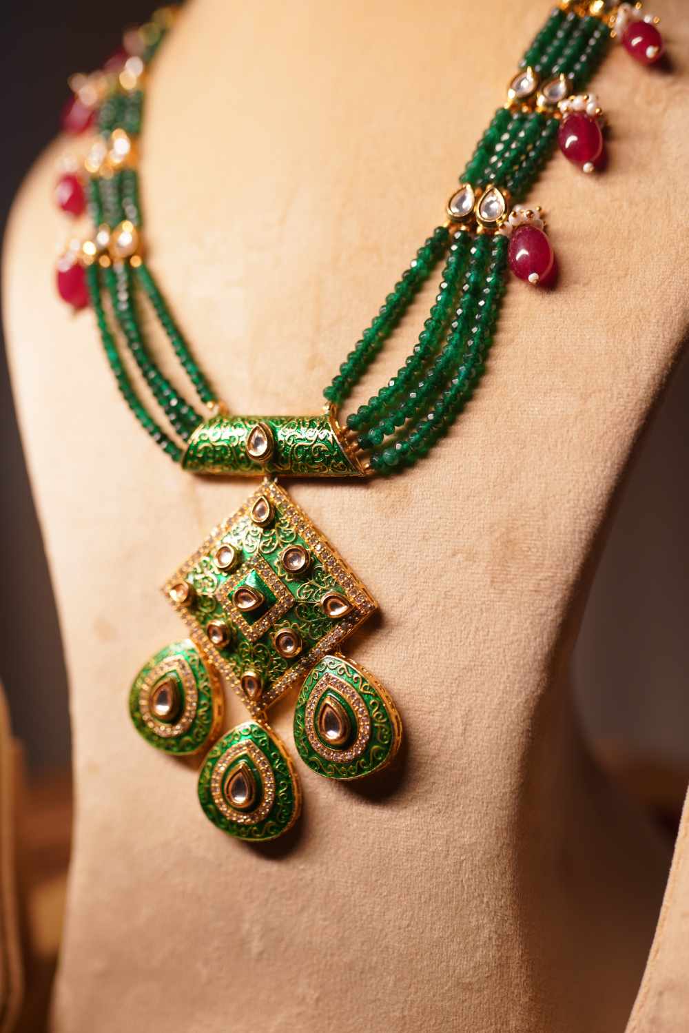 Emerald green beads with Meenakari Kundan pendant