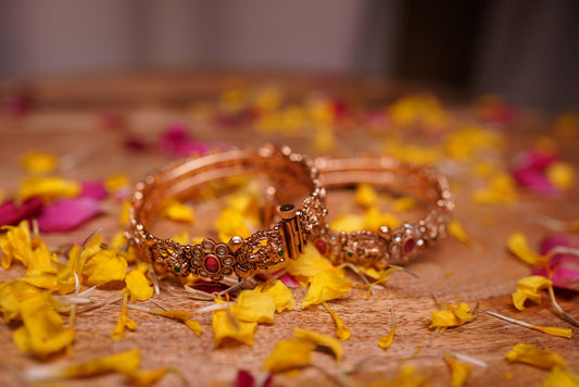 Gemstone kada bangles with antique gold finish