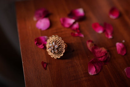 Gold-toned floral ring with intricate handcrafted detailing