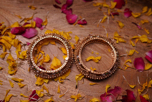 Golden filigree bangles with handcrafted detailing
