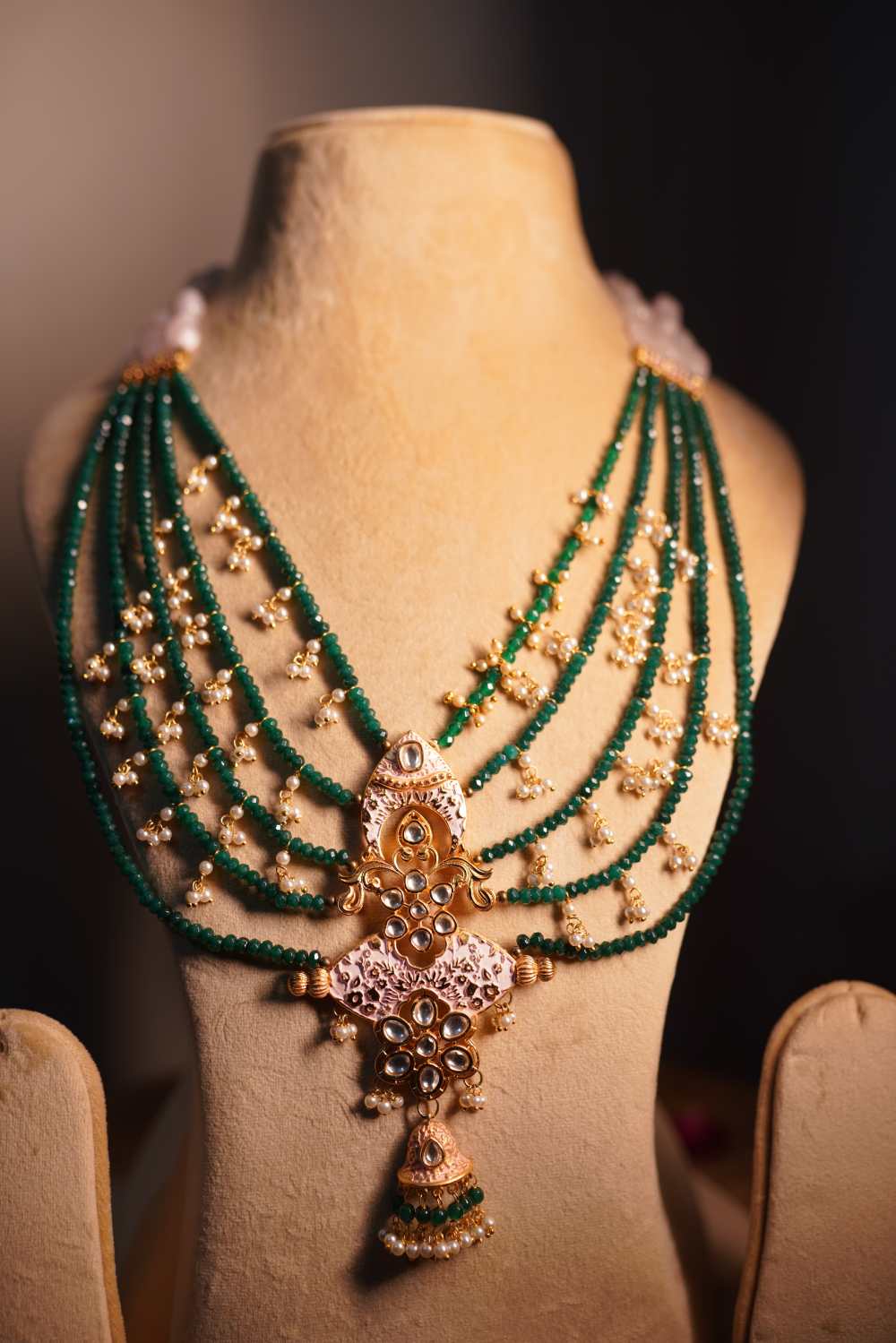 Grand emerald green beaded mala with antique gold temple pendant
