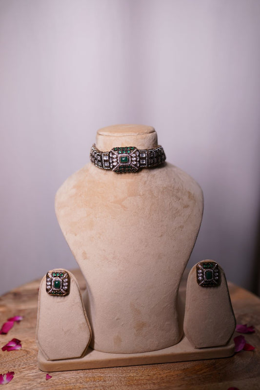 Green oxidized silver necklace set with green stone accents