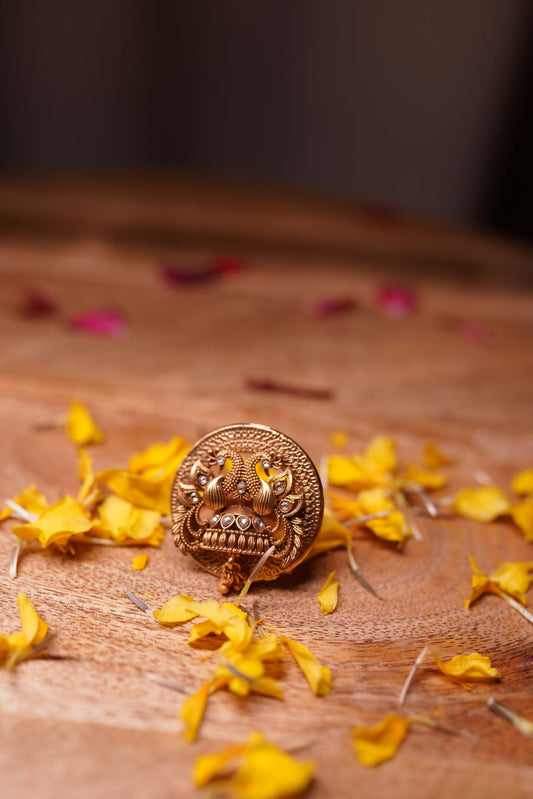 Handcrafted brass peacock ring with traditional motif