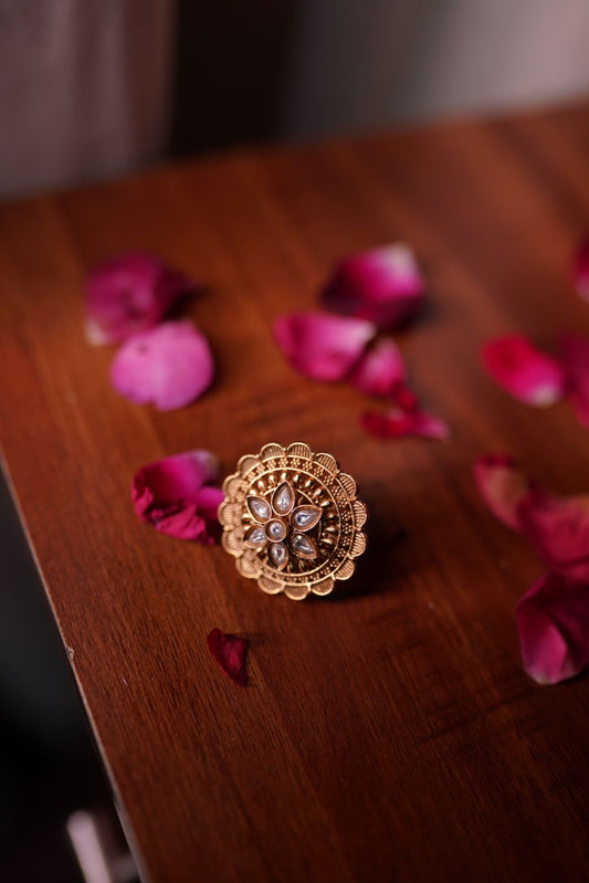 Handcrafted traditional gold-toned ring with floral design