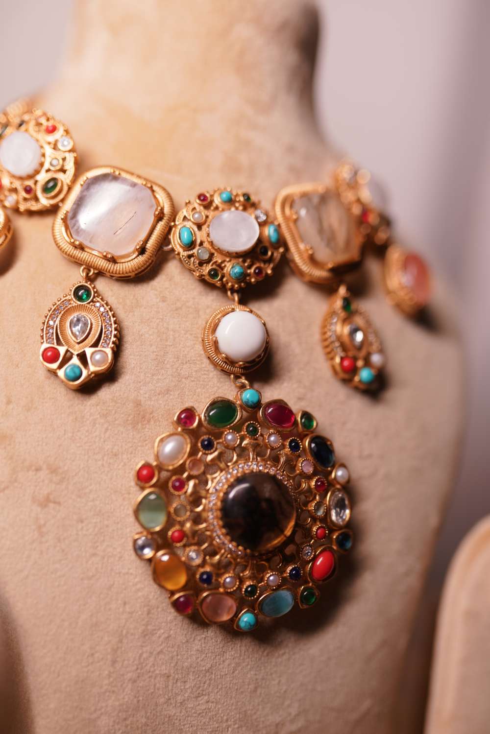 Navratan bridal necklace with ruby emerald turquoise and pearl embellishments