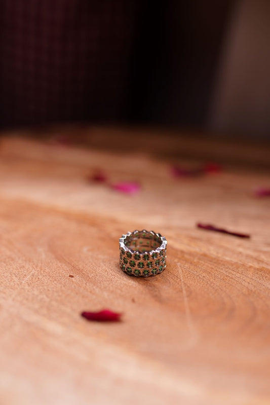 Ornate green stone statement ring