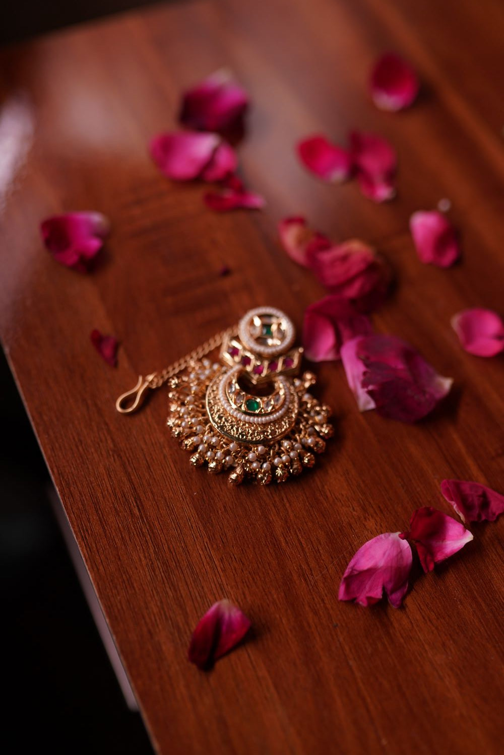 Premium antique gold maang tikka with green stones