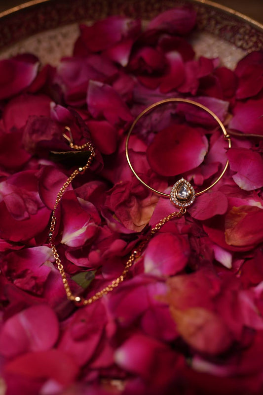 Rose gold nath with ruby gemstone
