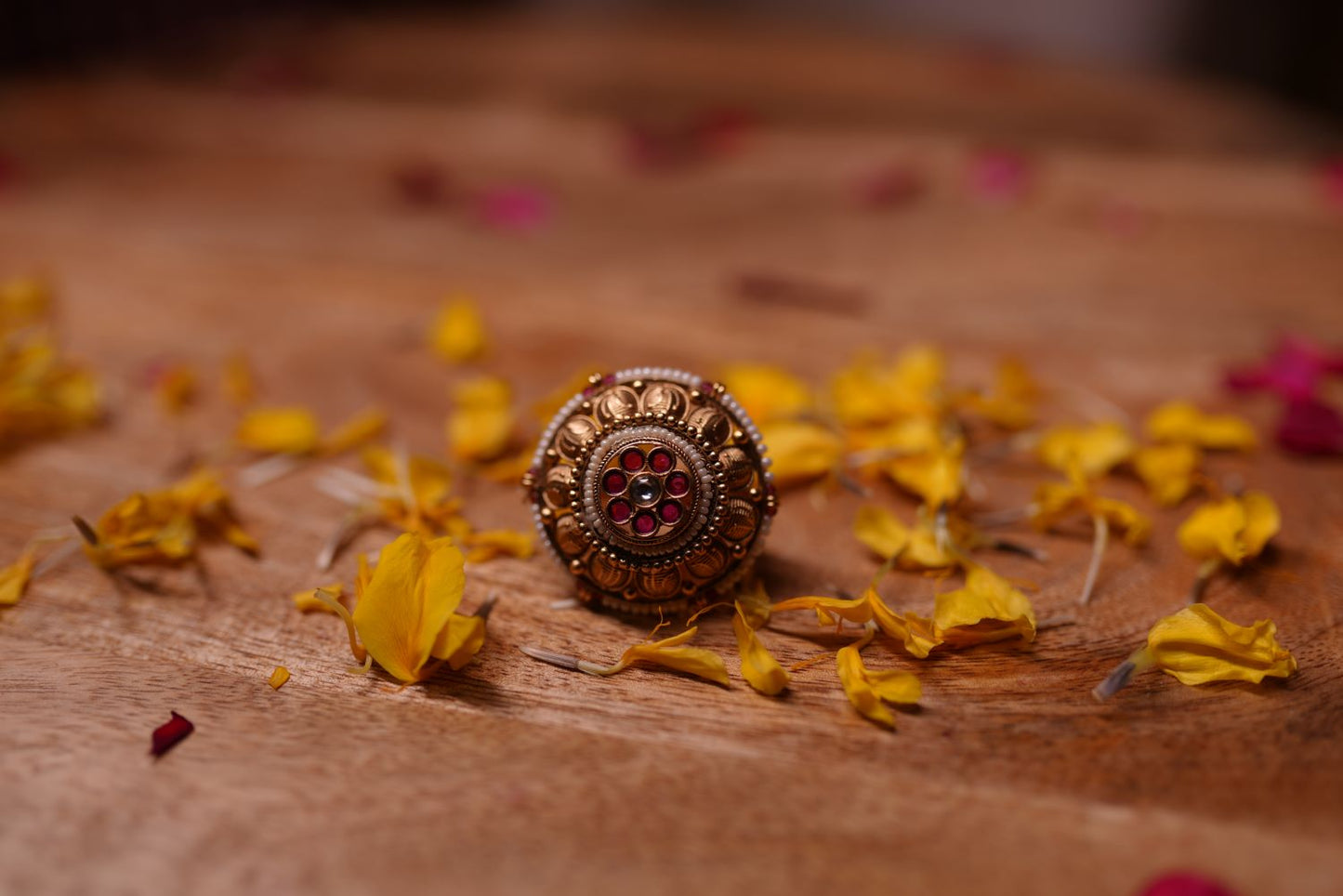 Ruby flower ring with antique gold finish