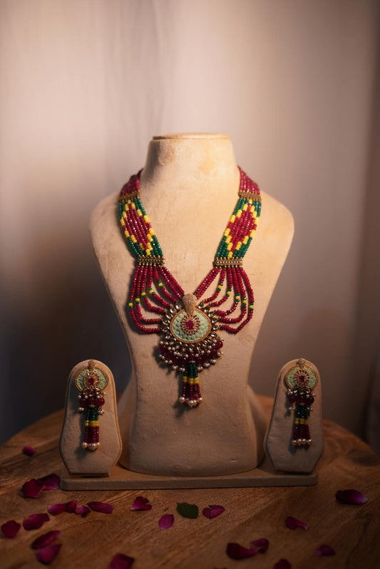 Ruby red Kundan mala set with antique gold pendant