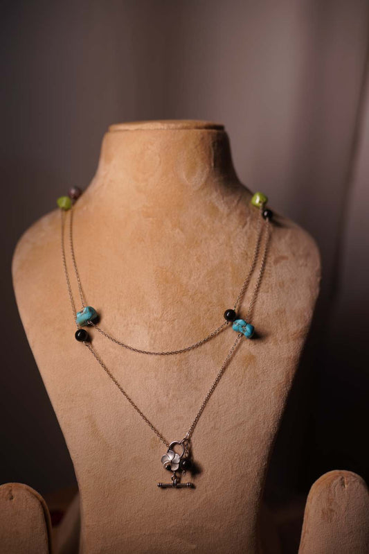 Turquoise and black onyx mala with sterling silver flower pendant