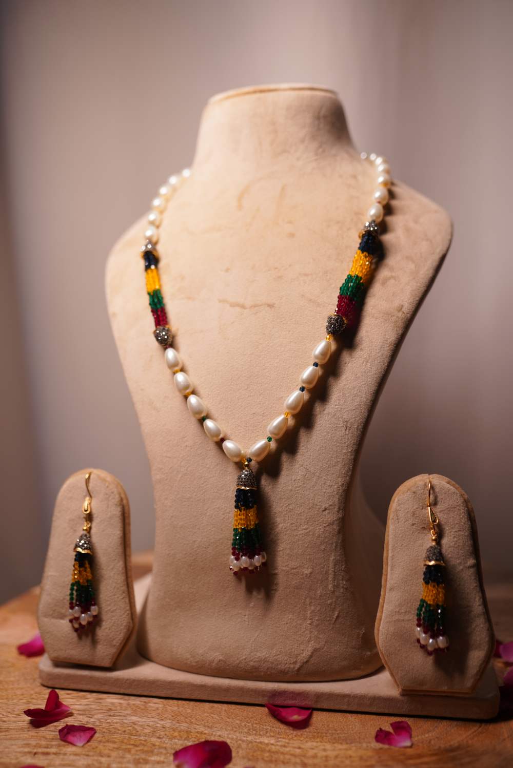 White pearl mala with multicolored gemstone tassel